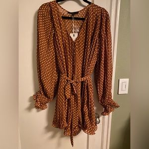 Size medium never worn with tags purchased at VICI.